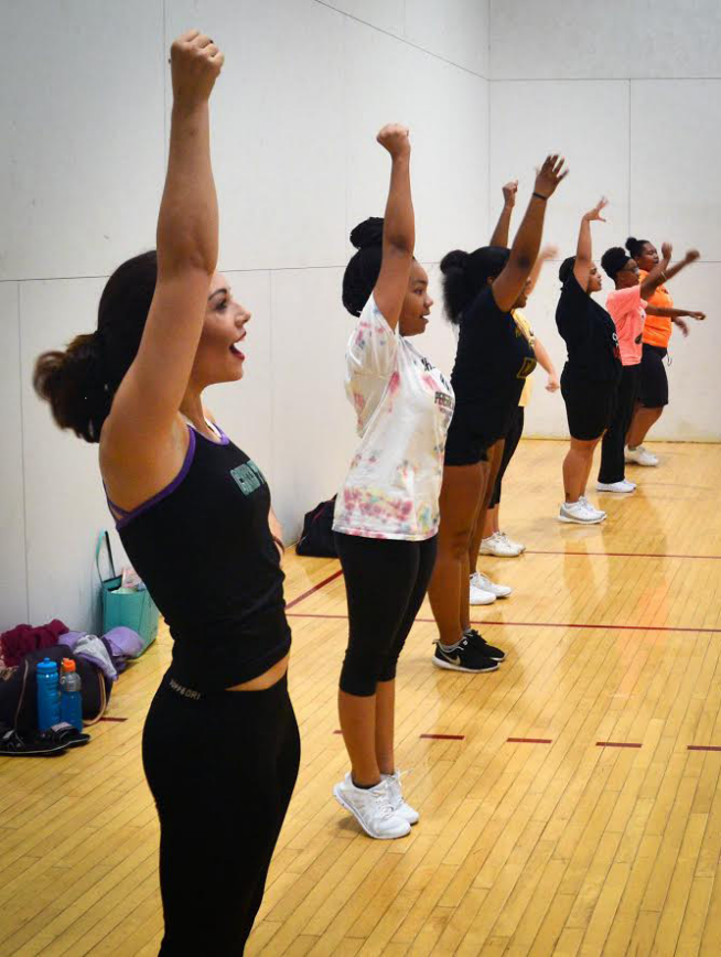 Cheer team potentials practice routines in hopes of making the cut