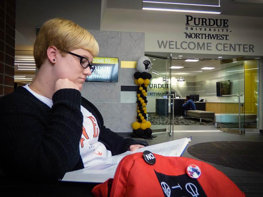 Emma Rose, junior human development and family studies major, studies before class in the SUL Concourse.
