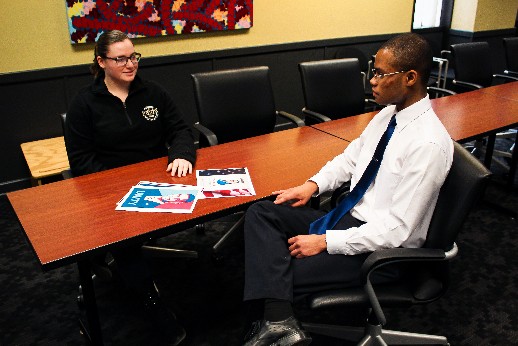 Victoria Von Uhl (left), junior communication major, discusses campaign strategy with Eric
Taylor (right), junior finance, accounting and business analytics major.