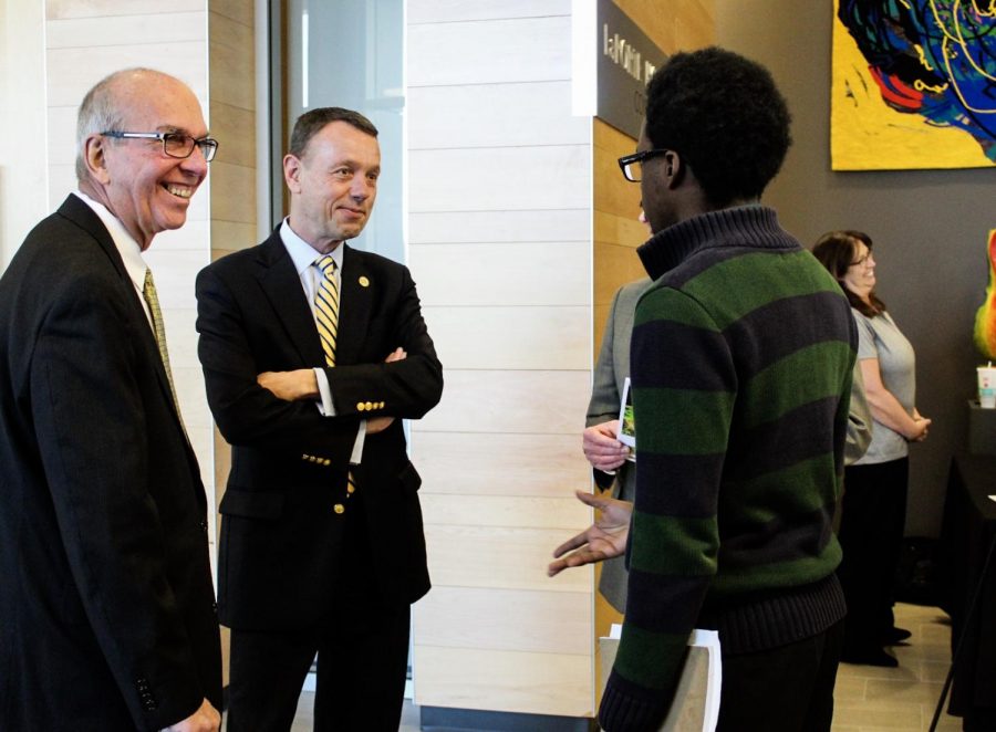 Chancellor Thomas Keon (left), Provost Ralph Mueller (center) and SGA President Daquan Williams (right) speak together at
Founders Day on March 2.
