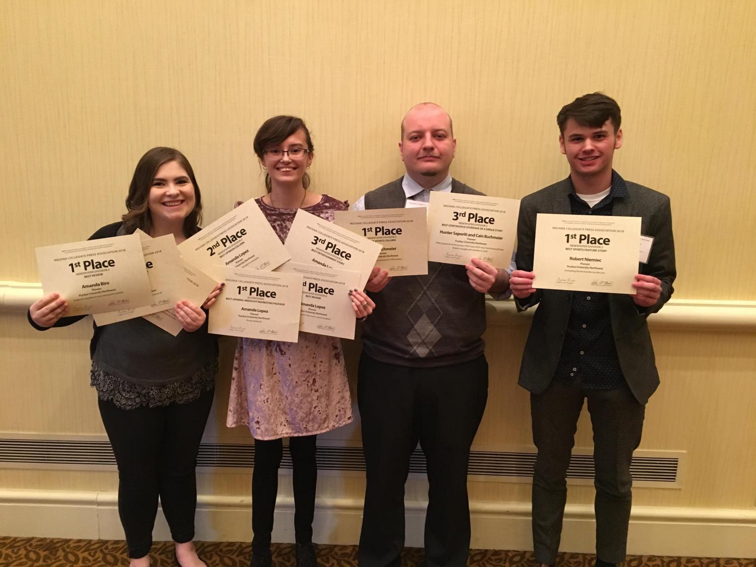 Amanda Biro, news editor; Amanda Lopez, editor-in-chief; Cain Buchmeier, copy editor, and Robert Niemiec, staff writer, (left to right) attend the April 7 Indiana Collegiate Press Association 2018 convention.