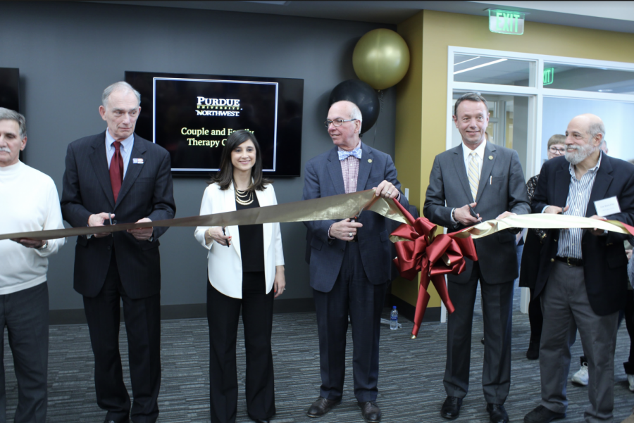 U. S. Rep. Pete Visclosky, Z. Seda Gulvas, interim director of the Couple and Family Center, Chancellor Thomas Keon and Provost Ralph Mueller cut the ribbon at the opening ceremony.