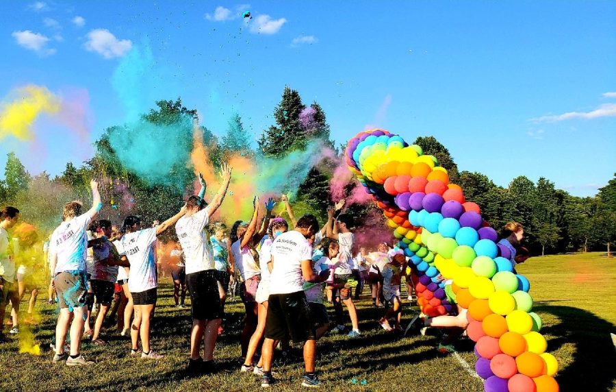 Students at the Westville campus showered each other in color at the starting line for the annual Pride Stride, a 5K run on the campus’ cross country course. Th e Sept. 9 event celebrated the start of a new school year. 