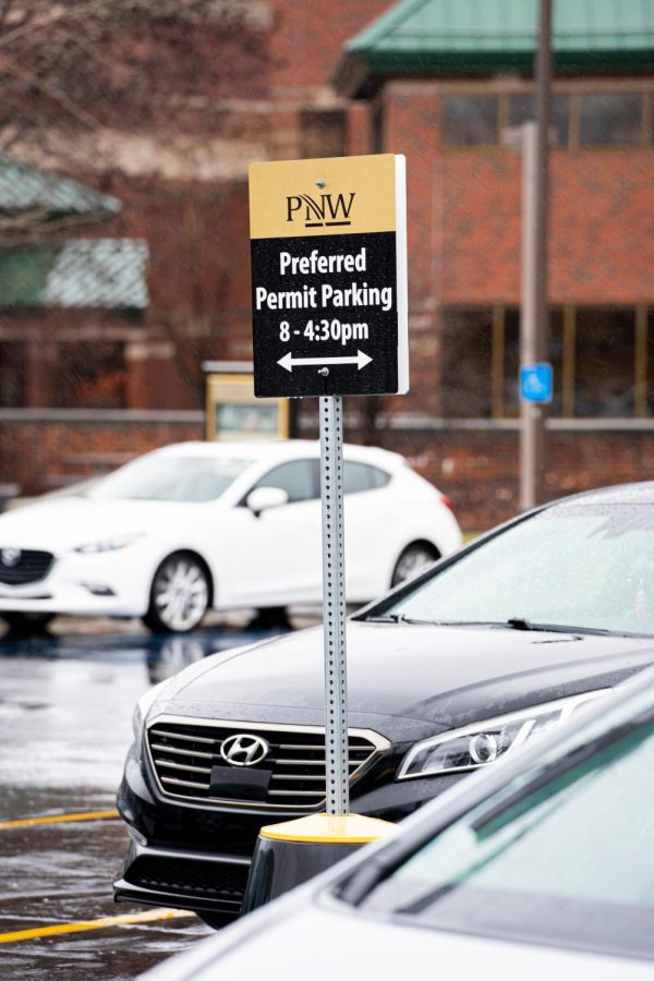 The university’s preferred parking policy frustrates many students who must hike from distant parking spots, past empty spaces, to get to class. Public Safety defends the system, saying it mirrors parking practices at other schools.
