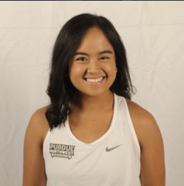 Senior Patricia Dizon says the tennis team’s focus on family builds a sense of team. (Photo by PNW Athletics)