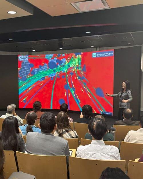 Chenn Zhou, NIPSCO Distinguished Professor of Engineering Simulation and director of PNW’s Center for Innovation through Visualization and Simulation (CIVS), presents at the 2024 Society for Industrial and Applied Mathematics (SIAM) Great Lakes Section annual conference. (PNW photo)